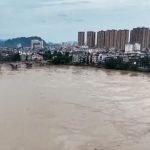Rain and flooding from Typhoon Narra hits China and Vietnam
