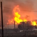 Wildfire burns out of control in Reno as thousands evacuate