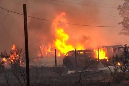 Wildfire burns out of control in Reno as thousands evacuate