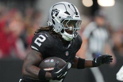 Jeanty helped off with apparent right knee injury