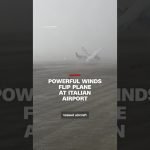 Powerful winds flip plane at Italian airport